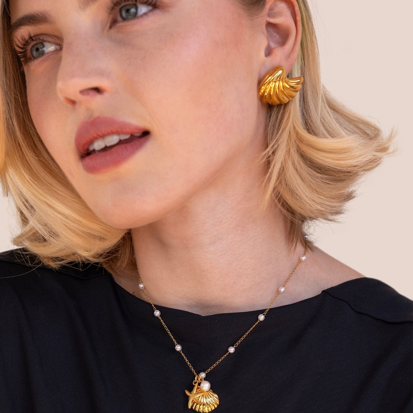 Gouden Schelp Oorbellen