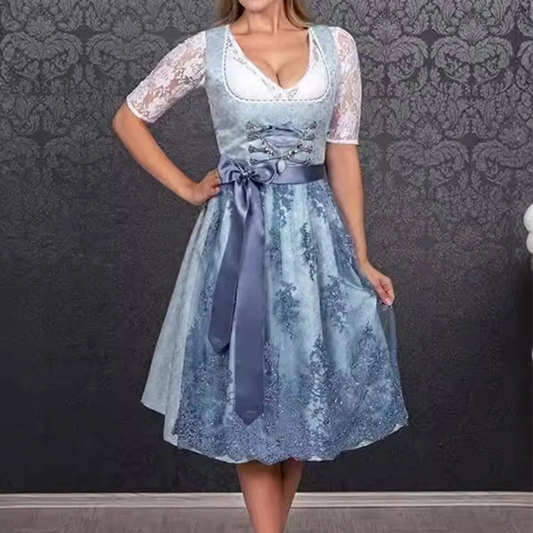 Stijlvol dames dirndl voor Oktoberfest met elegante schort en trendy corsage