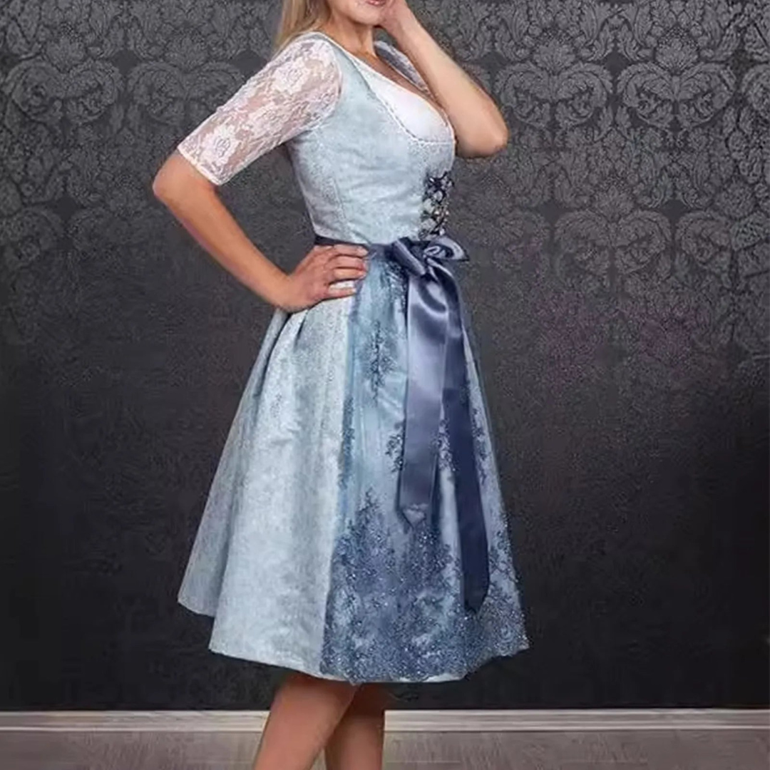 Stijlvol dames dirndl voor Oktoberfest met elegante schort en trendy corsage
