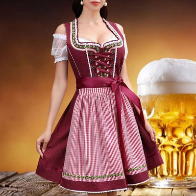 Stijlvolle dames dirndl jurk voor Oktoberfest met een charmante schort, elegante corsage en aantrekkelijke details